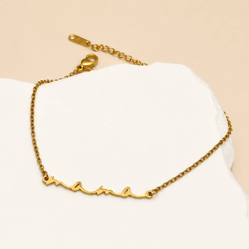 Everly Mama bracelet showing the gold chain, extender and lobster-claw closure
